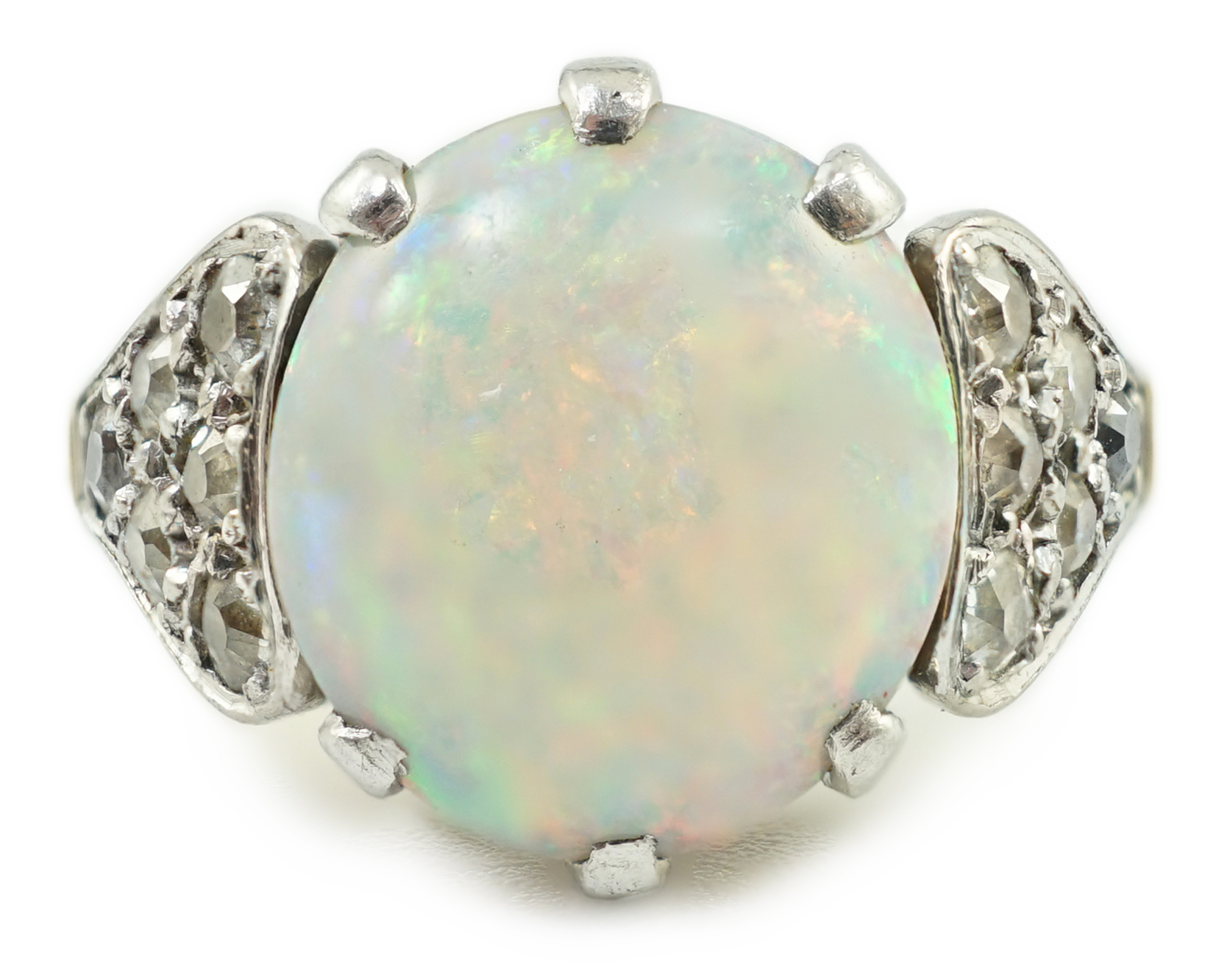 An 18ct gold and single stone white opal set ring, with twelve stone diamond set shoulders